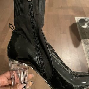 Black bootie with 3 inch acrylic heel